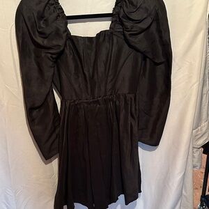 Aje black puff sleeve mini dress
Worn 1x size 6